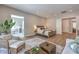 Well-lit main bedroom with ensuite bathroom and seating area at 9 Rue Grimaldi Way, Henderson, NV 89011