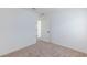 A clean bedroom featuring neutral carpet and modern white trim and doors at 9086 Nostrand Ave, Las Vegas, NV 89148