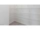 Walk in closet with built-in shelving at 9086 Nostrand Ave, Las Vegas, NV 89148