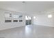 Bright living space with large windows and light tile flooring at 9086 Nostrand Ave, Las Vegas, NV 89148