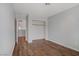 Bedroom with wood flooring, closet and a doorway at 9190 Wine Cellar Ave, Las Vegas, NV 89148