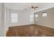 Bright living room features hardwood floors, neutral paint, and a modern ceiling fan for added comfort at 9190 Wine Cellar Ave, Las Vegas, NV 89148