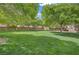 Enjoy the outdoors at the community park with mature trees and a large grassy area at 9190 Wine Cellar Ave, Las Vegas, NV 89148