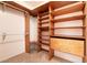 Walk-in closet with custom built-in shelving and drawers at 9329 January Dr, Las Vegas, NV 89134