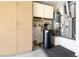 Garage: Water heater, water softener, and storage cabinet at 9329 January Dr, Las Vegas, NV 89134