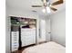 Bedroom includes a closet with organized storage, a dresser, and a ceiling fan for added comfort at 9333 Jumpin Juniper Ave, Las Vegas, NV 89129