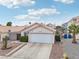 A well-kept single-story home with a convenient two-car garage and low maintenance landscaping at 9333 Jumpin Juniper Ave, Las Vegas, NV 89129
