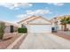 Charming single-story home with low maintenance landscaping and a two-car garage at 9333 Jumpin Juniper Ave, Las Vegas, NV 89129