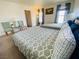 Cozy bedroom with two beds, large windows and carpet throughout at 11117 Okeefe Ct, Las Vegas, NV 89144