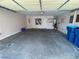 Garage interior featuring concrete floor, interior access door, and ample space for parking at 11117 Okeefe Ct, Las Vegas, NV 89144