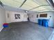Spacious garage featuring ample storage space with a concrete floor, and an automatic door at 11117 Okeefe Ct, Las Vegas, NV 89144