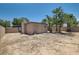 Backyard featuring a block wall fence and palm trees at 1404 Atlantic St, Las Vegas, NV 89104