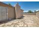 A backyard area featuring a block wall and stone pavers perfect for outdoor lounging and entertaining guests at 1404 Atlantic St, Las Vegas, NV 89104