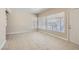 Living room featuring tile floors, bright windows, and a neutral color scheme at 1404 Atlantic St, Las Vegas, NV 89104