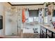 Relaxing bathroom with walk-in shower, soaking tub, stylish tile, and double vanity at 1413 Miller Ridge Ave, North Las Vegas, NV 89031