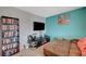 Bedroom with ample storage, a TV, and stylish furniture create a great relaxing place at 1413 Miller Ridge Ave, North Las Vegas, NV 89031