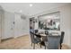 Open dining area providing an elegant dining table and lots of space at 1413 Miller Ridge Ave, North Las Vegas, NV 89031