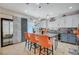 Modern kitchen with granite countertops, white cabinetry, and stainless steel appliances at 1413 Miller Ridge Ave, North Las Vegas, NV 89031