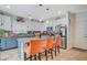 Modern kitchen with granite countertops, white cabinetry, and stainless steel appliances at 1413 Miller Ridge Ave, North Las Vegas, NV 89031