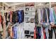 Spacious walk-in closet with custom shelving and ample hanging space for clothes and accessories at 1413 Miller Ridge Ave, North Las Vegas, NV 89031