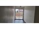 Living room with sliding glass doors leading to a private backyard area at 1612 N Torrey Pines Dr # 104, Las Vegas, NV 89108