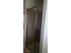 Tiled shower with a glass door and chrome hardware, providing a sleek and modern bathroom feature at 1612 N Torrey Pines Dr # 104, Las Vegas, NV 89108