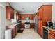 Well-equipped kitchen with stainless steel appliances, granite countertops, and ample cabinet space for storage at 2057 Wandering Doe Ln, Las Vegas, NV 89134