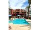 Outdoor pool with sun loungers at 23 E Agate Ave # 403, Las Vegas, NV 89123