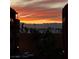 Scenic sunset view overlooking palm trees and building at 23 E Agate Ave # 403, Las Vegas, NV 89123