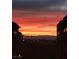 Scenic sunset view overlooking palm trees and building at 23 E Agate Ave # 403, Las Vegas, NV 89123