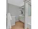 Bright bathroom with single vanity, towel bar, and combined tub and shower at 2699 Aldonza Dr, Henderson, NV 89014
