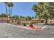 Landscaped community entrance with gate and fire hydrant on a sunny day at 2708 Campo Verde Dr, Las Vegas, NV 89121