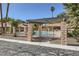 Gated community pool with shade covering is easily accessed with a paved walkway at 2708 Campo Verde Dr, Las Vegas, NV 89121