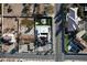 Birds eye view of a home with landscaping, putting green, pool, and outdoor bar area at 2890 Belcastro St, Las Vegas, NV 89117