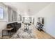 Spacious bedroom with a living area, large windows, and contemporary furnishings at 2890 Belcastro St, Las Vegas, NV 89117