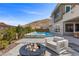 Luxury backyard with pool, spa, fire pit and mountain views at 2890 Reverence Heights Ln, Las Vegas, NV 89138