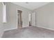 Spacious bedroom features neutral decor, soft carpeting, and ample natural light, offering a comfortable space at 2890 Reverence Heights Ln, Las Vegas, NV 89138