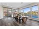 Open dining room with outside spiral staircase, and view of the pool at 2890 Reverence Heights Ln, Las Vegas, NV 89138