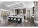 Spacious kitchen with stainless steel appliances, a large island with seating, and sleek countertops at 2890 Reverence Heights Ln, Las Vegas, NV 89138