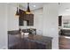 Kitchen wet bar with pendant lights, modern cabinets and granite countertops at 2890 Reverence Heights Ln, Las Vegas, NV 89138