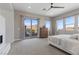 Bright main bedroom with mountain views and access to the balcony at 2890 Reverence Heights Ln, Las Vegas, NV 89138