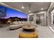 Luxurious outdoor patio features comfortable seating, and views of the pool at 2890 Reverence Heights Ln, Las Vegas, NV 89138