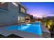 Backyard pool area, perfect for entertaining and relaxing, with an inviting design and serene ambiance at 2890 Reverence Heights Ln, Las Vegas, NV 89138
