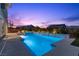 Inviting pool with water feature and mountain views, perfect for relaxation and outdoor enjoyment at 2890 Reverence Heights Ln, Las Vegas, NV 89138