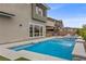 Contemporary home with a swimming pool and spa featuring mountain views at 2890 Reverence Heights Ln, Las Vegas, NV 89138