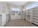 Large walk-in closet with custom shelves at 2890 Reverence Heights Ln, Las Vegas, NV 89138