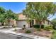 Charming home with lush landscaping, mature trees, and a well-maintained front yard at 2958 Lapis Beach Dr, Las Vegas, NV 89117