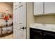 Laundry room featuring a utility sink, counter space and entry to the hallway at 2958 Lapis Beach Dr, Las Vegas, NV 89117