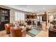 Open living space with modern kitchen featuring stainless steel appliances and casual seating at 2958 Lapis Beach Dr, Las Vegas, NV 89117