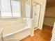 Bathroom showcasing a relaxing tub, sleek shower, and tile floors at 3372 Wayward Ct, Las Vegas, NV 89129